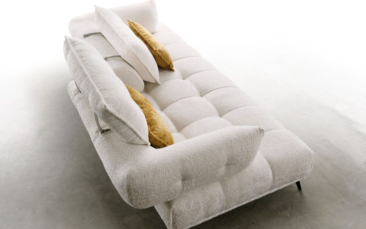 Canapé capitonné dossier et accoudoir avance/recule - Story